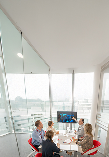 Tax colleagues looking at a screen