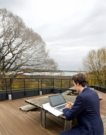 Professional working on his laptop