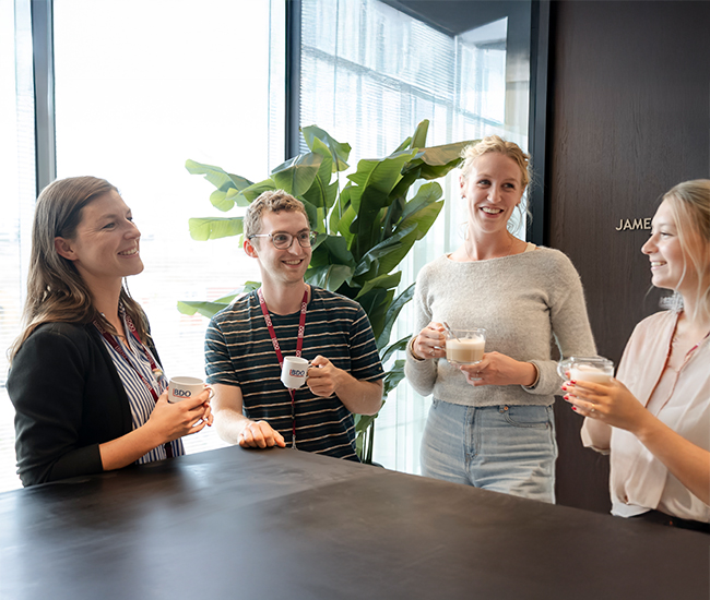 People talking and enjoying a coffee together