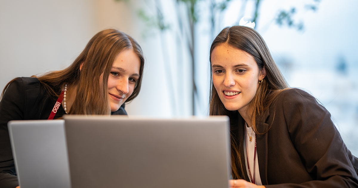 Girls looking at job offers